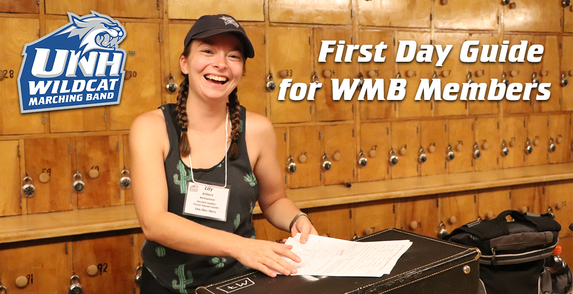 Smiling mellophone player with braids wears a nametag with marching band logo in corner and First Day Guide for WMB Members in white text